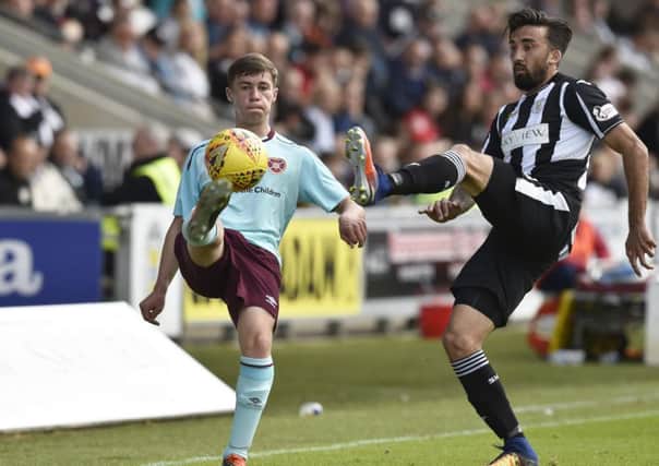 Hearts Colts' Jay Sandison (left) and Stelios Demetriou of St Mirren - who could line up against the wee Jambos for Ross County. Picture: SNS Group