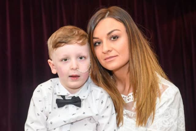 Alex Logan pictured with his mother Paula. Picture: Ian Georgeson