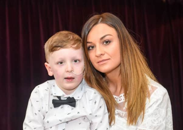 Alex Logan pictured with his mother Paula. Picture: Ian Georgeson