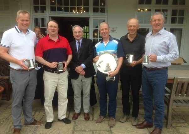Flanking Worplesdon GC President Michael Thorpe are Watsonian team members, from left, Graeme Johnston, Brian Tait, captain Brian Bingham with the Cyril Gray Trophy, Patrick Tomisson and Gavin Hastings. Pic: TSPL
