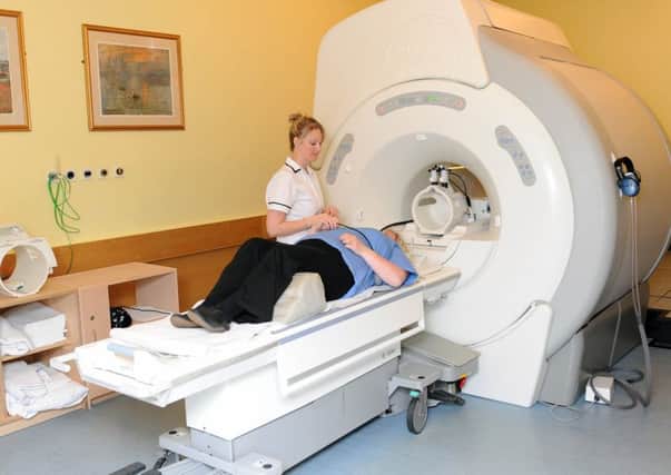 An MRI scanner makes quite a racket when you are inside, but Susan Morrison managed to fall asleep
