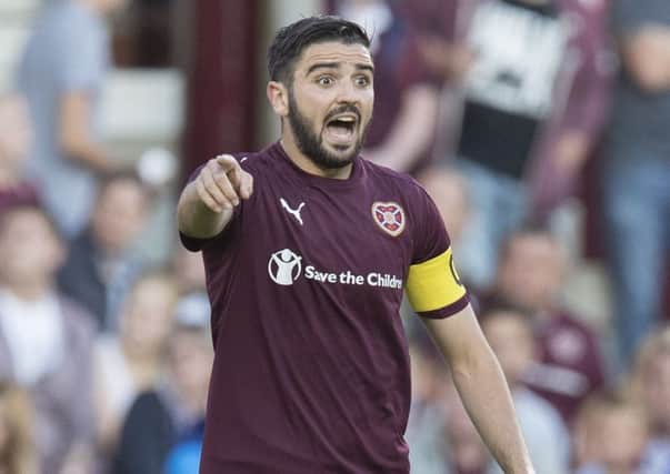 Alim Ozturk captained Hearts during his spell at Tynecastle. Pic: SNS