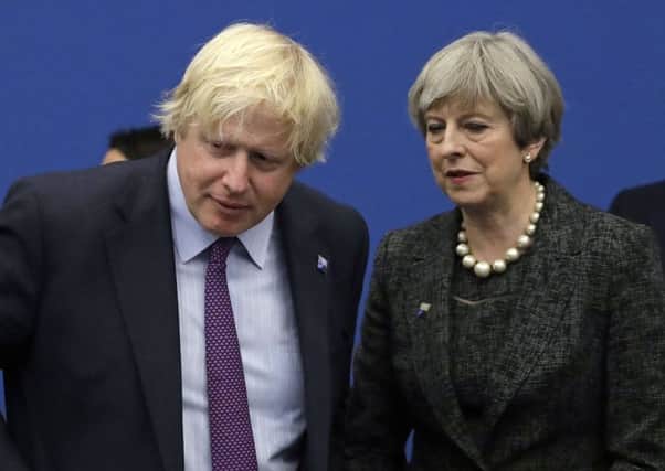 Boris Johnson's resignation as Foreign Secretary has increased the pressure on Theresa May (Picture: AP)
