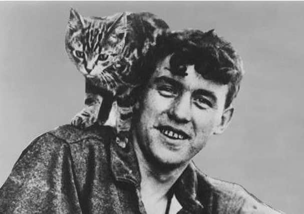 lWilliam Ballantyne and Wopsie the Cat.