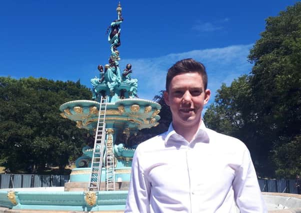 David Ellis stands in front of the revamped Ross Fountain, which his firm, the Ross Development Trust, has overhauled