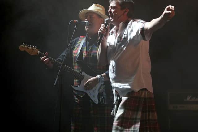 Alan Longmuir (left) and Les McKeown of the Bay City Rollers performing together on stage. Picture: Jane Barlow/PA Wire