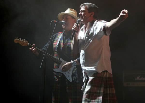 Alan Longmuir (left) and Les McKeown of the Bay City Rollers performing together on stage.  Picture: Jane Barlow/PA Wire