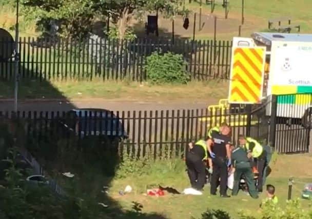 Video footage sent to the Edinburgh Evening News shows paramedics attempting to save the man.