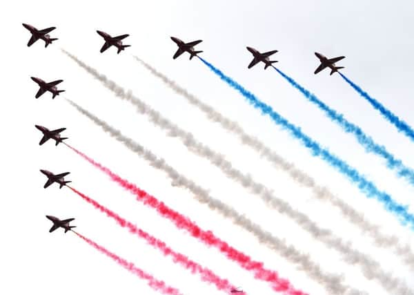 Red Arrows flying over Buckingham Palace, London in the Royal Air Force 100 flypast to mark the RAF's centenary. Picture; PA