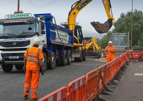 Roadworks around Edinburgh are causing delays for motorists. Picture: TSPL