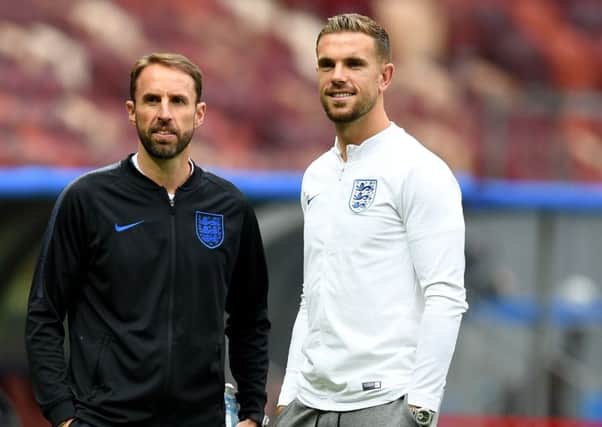 Jordan Henderson and England's coach Gareth Southgate inspect the pitch of the Luzhniki Stadium in Moscow ahead of their semi-final match against Croatia. Picture; Getty