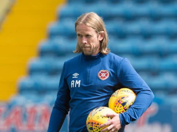 Hearts assistant coach Austin MacPhee has rejected the manager's job at Pune City