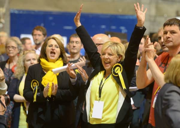 Claire Bridgman (left) celebrates at last year's election count with another successful candidate Cathy Fullerton