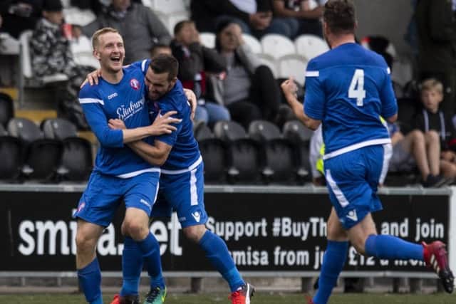 Scott Maxwell celebrates scoring for Spartans against St Mirren