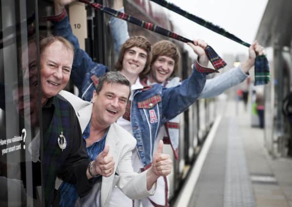 Alan Longmuir and Les McKeown pose with the boys from 'I Ran With The Gang'.