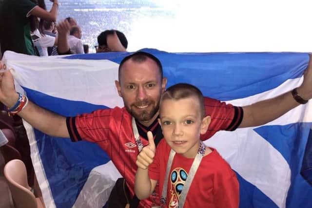 Iain Meiklejohn and son Aleks at the World Cup Final