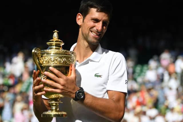 Novak Djokovic with the winners trophy