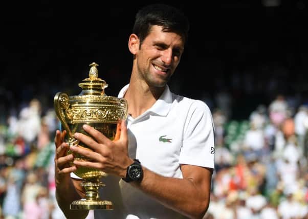 Novak Djokovic with the winners trophy