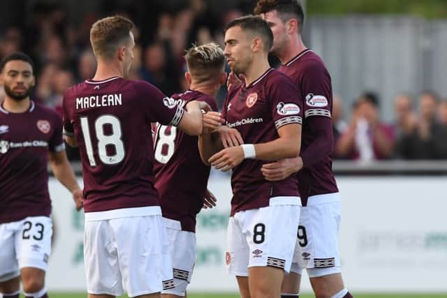 Hearts players celebrate afer Olly Lee opens the scoring. Picture: SNS/Gary Hutchison