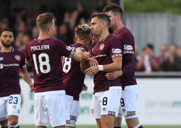 Hearts players celebrate afer Olly Lee opens the scoring. Picture: SNS/Gary Hutchison