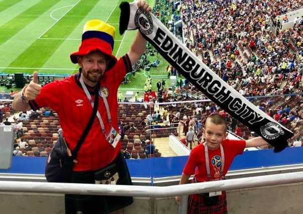 Iain Meiklejohn and son Aleks at the World Cup Final