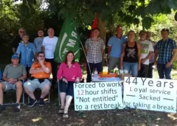 Protesters at Arundel Station against Peter Lees (third from right) dismissal (Photo: West Sussex County Times)