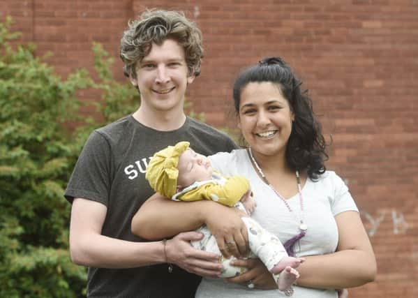 Matthew and Stephanie Faulds with 10 week old Jasmina.  They are crowd funding a zero waste shop.