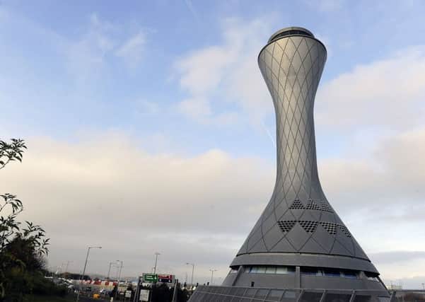 Passengers were removed by police from a flight at Edinburgh Airport.
