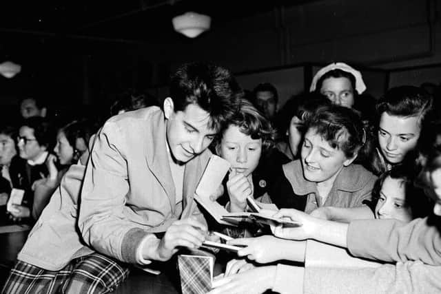 Jackie Dennis - Signs autograph books in J R Allan Store in 1958.