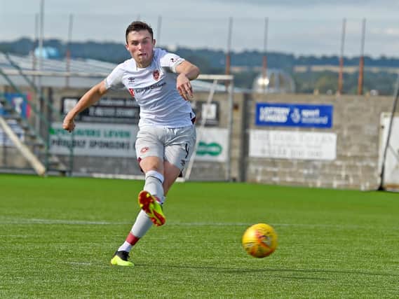 John Souttar scores Hearts' final penalty against Raith Rovers at Bayview