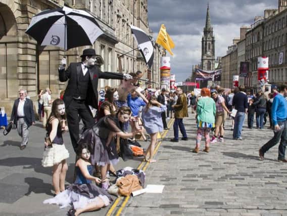 Street performers at the Edinburgh Festival Fringe will no longer have to rely on audience members to carry cash (Photo: Shutterstock)