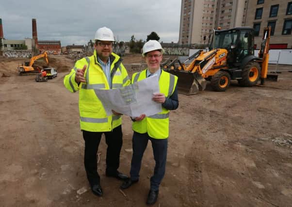 Scottish Housing Minister Kevin Stewart and Colin Rae of Places For People at the 374-home Shrubhill development in Leith. Picture