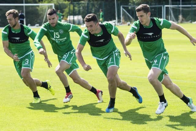 John McGinn, second right, and Paul Hanlon, far right, are both expected to start for Neil Lennon's side. Picture: SNS Group
