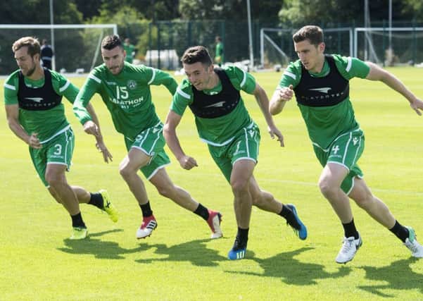John McGinn, second right, and Paul Hanlon, far right, are both expected to start for Neil Lennon's side. Picture: SNS Group