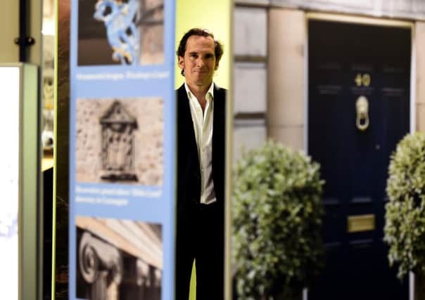 Adam Wilkinson, director of Edinburgh World Heritage, at the launch of the exhibition showcasing the Old and New Town. Picture: Lisa Ferguson
