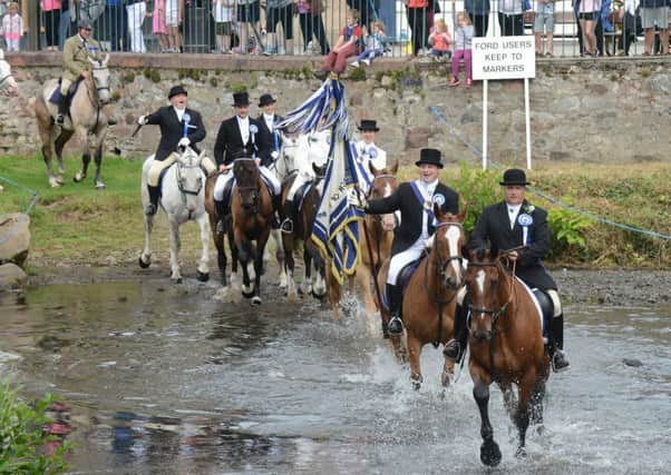 Musselburgh Festival Riders head down High Street. Picture; Jon Savage