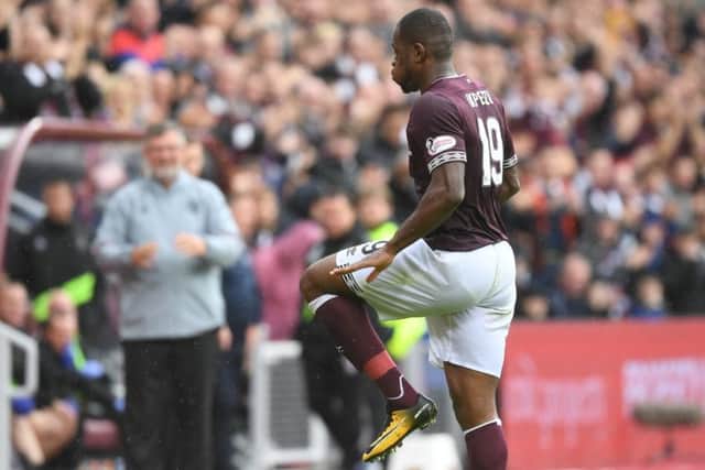 Uche Ikpeazu celebrates scoring Hearts' first goal by copying a celebration made famous by LeBron James