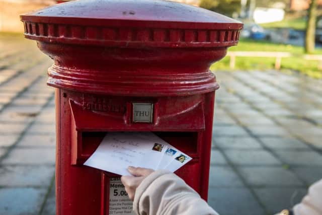 The Royal Mail remains the only delivery company which will deliver to every door in the country. Picture: John Devlin