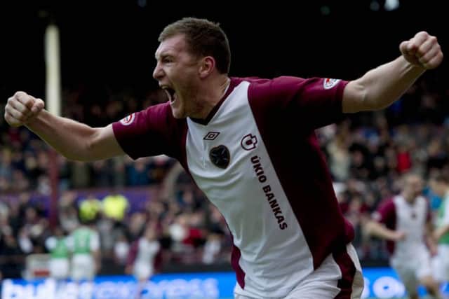 Kevin Kyle celebrates his goal for Hearts in  a derby win over Hibs. Picture: SNS/Alan Harvey