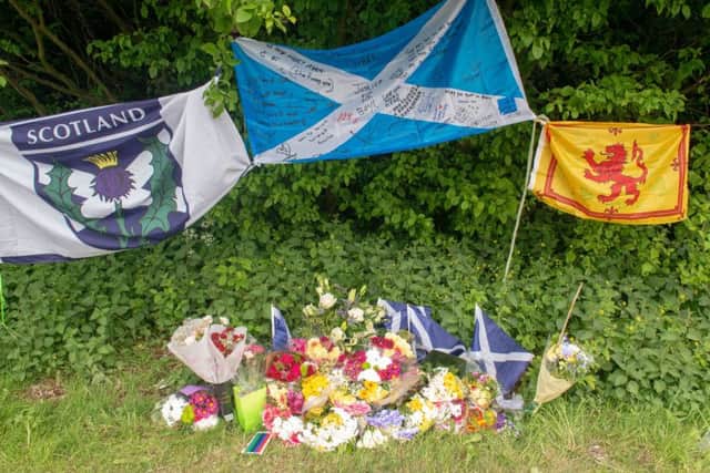 Tributes were left at the Maybury Road crash site for tragic Jonny Smith. Picture: Ian Georgeson