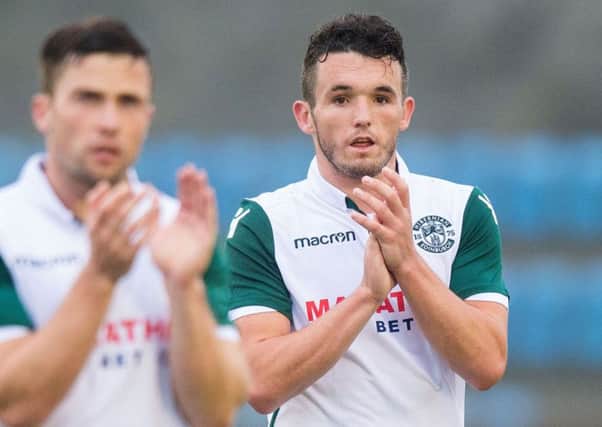 John McGinn's first half goal was enough to send Hibs through on aggregate after a 1-1 draw on the night. Picture: SNS Group