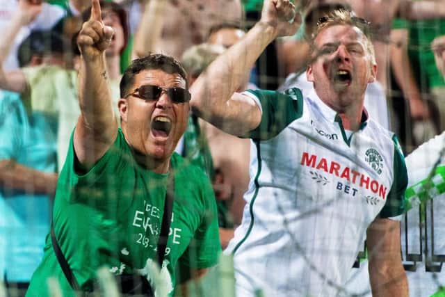Hibs fans celebrate defeating Asteras Tripolis on aggregate at the Theodoros Kolokotronis Stadium. Picture: SNS Group