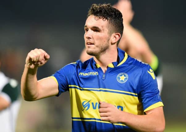John McGinn celebrates at full time after his goal helped defeat Asteras Tripolis on aggregate