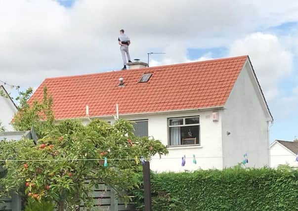 Police responded to a housebreaking this afternoon after a man was spotted on a roof a property in Silverknowes. Picture: Submitted
