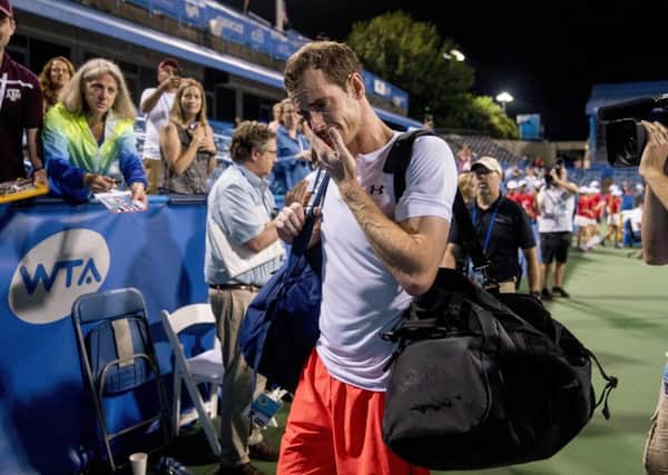 An emotional Andy Murray, of Britain, steps off court after defeating Marius Copil, of Romania, 6-7 (5), 3-6, 7-6 (4), during the Citi Open tennis tournament in Washington, Friday, Aug. 3, 2018. Picture; AP