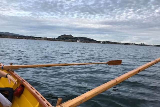 Early morning rowers spotted the dolphins and attempted to capture pictures; The picture was shared on the Eskmuthe Rowing Club Facebook page. Picture; Eskmuthe Rowing Club