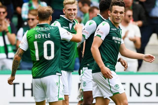 Oli Shaw celebrates with his Hibs team-mates. Picture: SNS