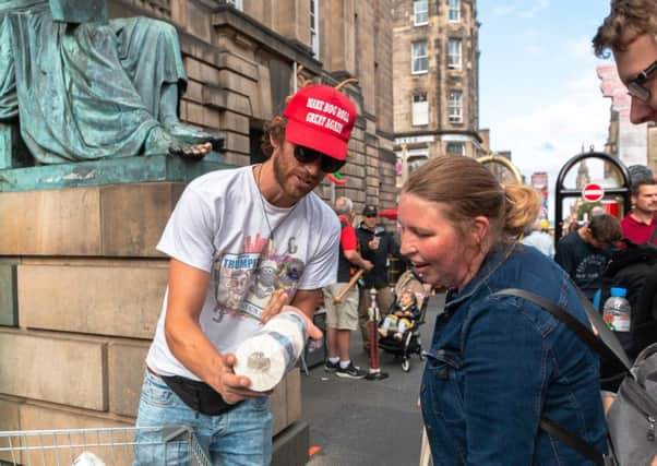 The boss of a marketing firm says he makes more money selling loo roll with Donald's Trump face printed on it to punters at the Edinburgh Fringe Festival than from his job. Picture; SWNS