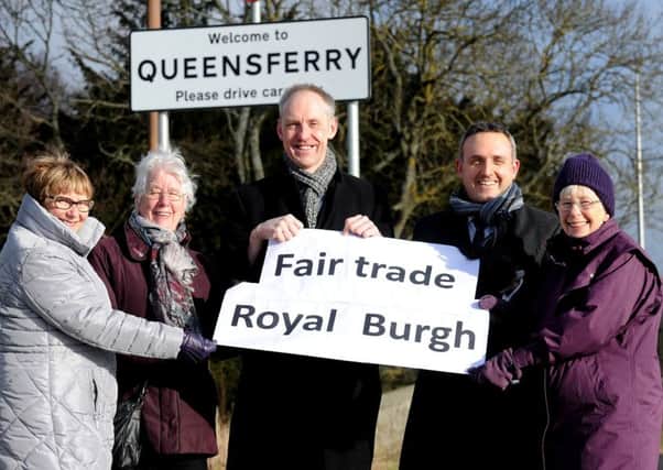 Janette McIvor, Jennifer Garner, Gwenneth Williamson are all members of South Queensferry Fair Trade group , councillor Kevin Lang and Alex Cole-Hamilton MSP
 are all backing the signs.