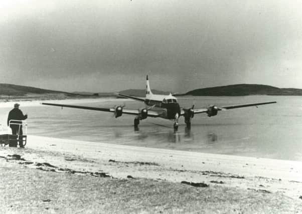 The first scheduled flight landed on Traigh Mhor on Barra on August 7, 1936. Pictured is a  De Havilland Rapide just after arrival. PIC: HIAL.